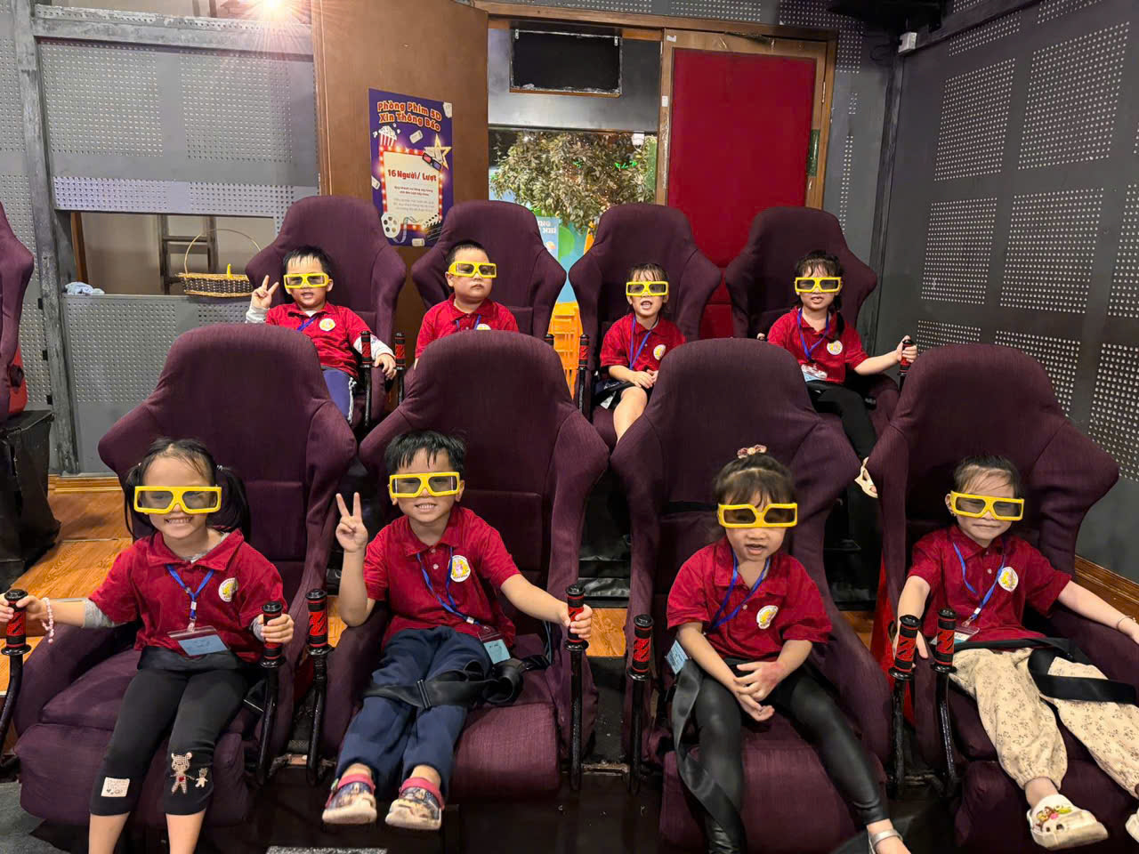 A group of children wearing glasses

Description automatically generated