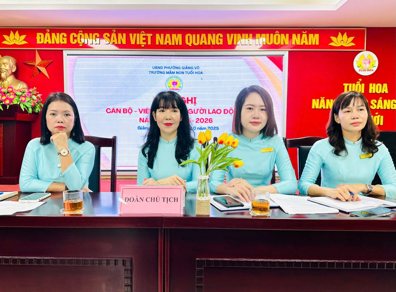 A group of women sitting at a table

AI-generated content may be incorrect.