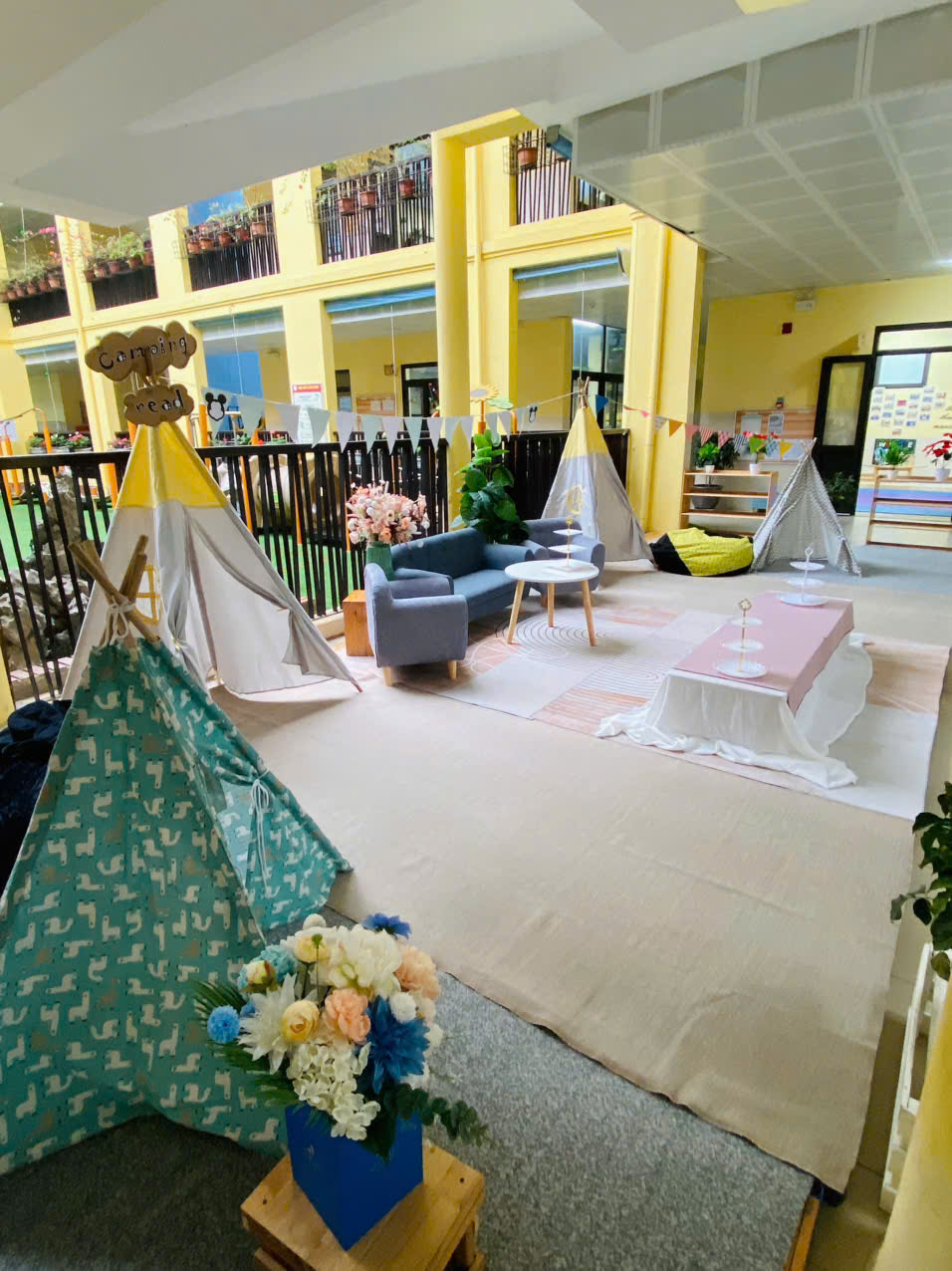 A room with a teepee and a couch

AI-generated content may be incorrect.