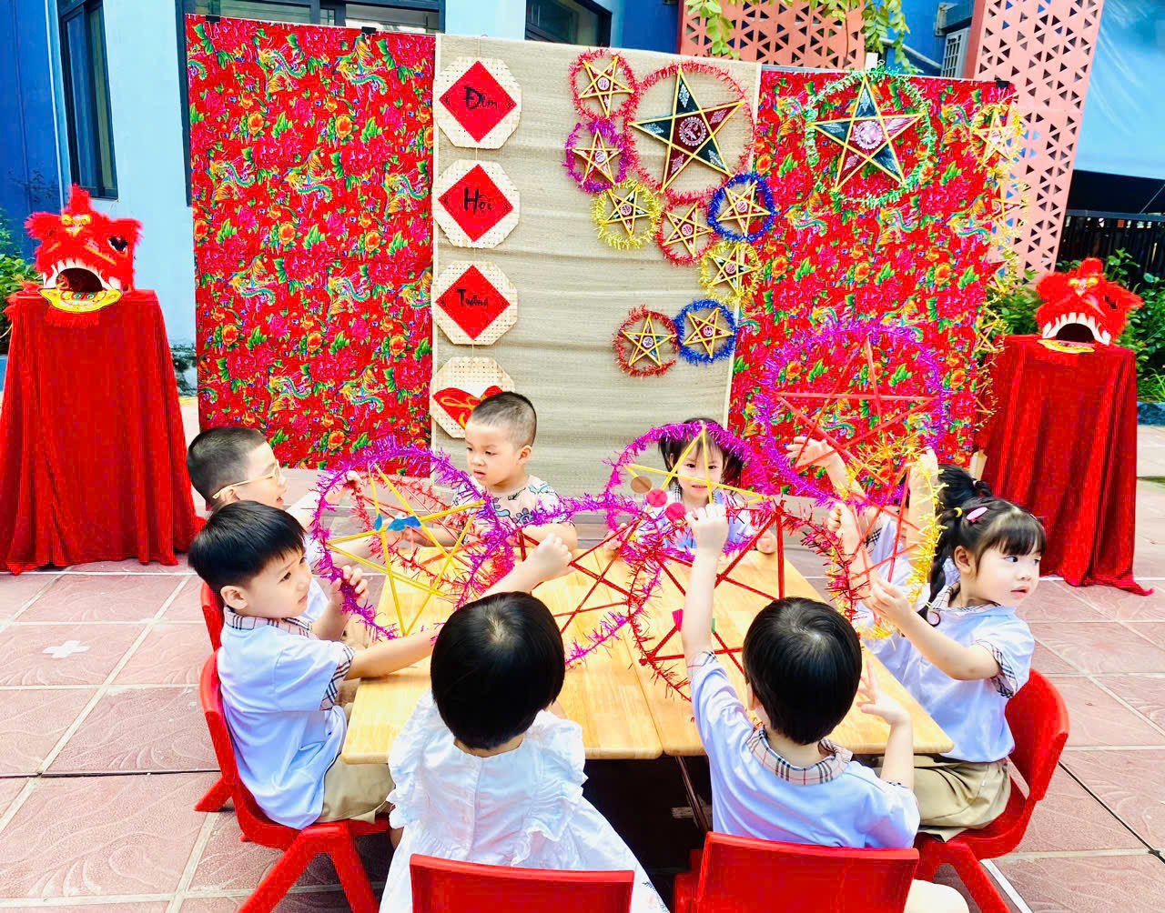 A group of children sitting at a table

AI-generated content may be incorrect.