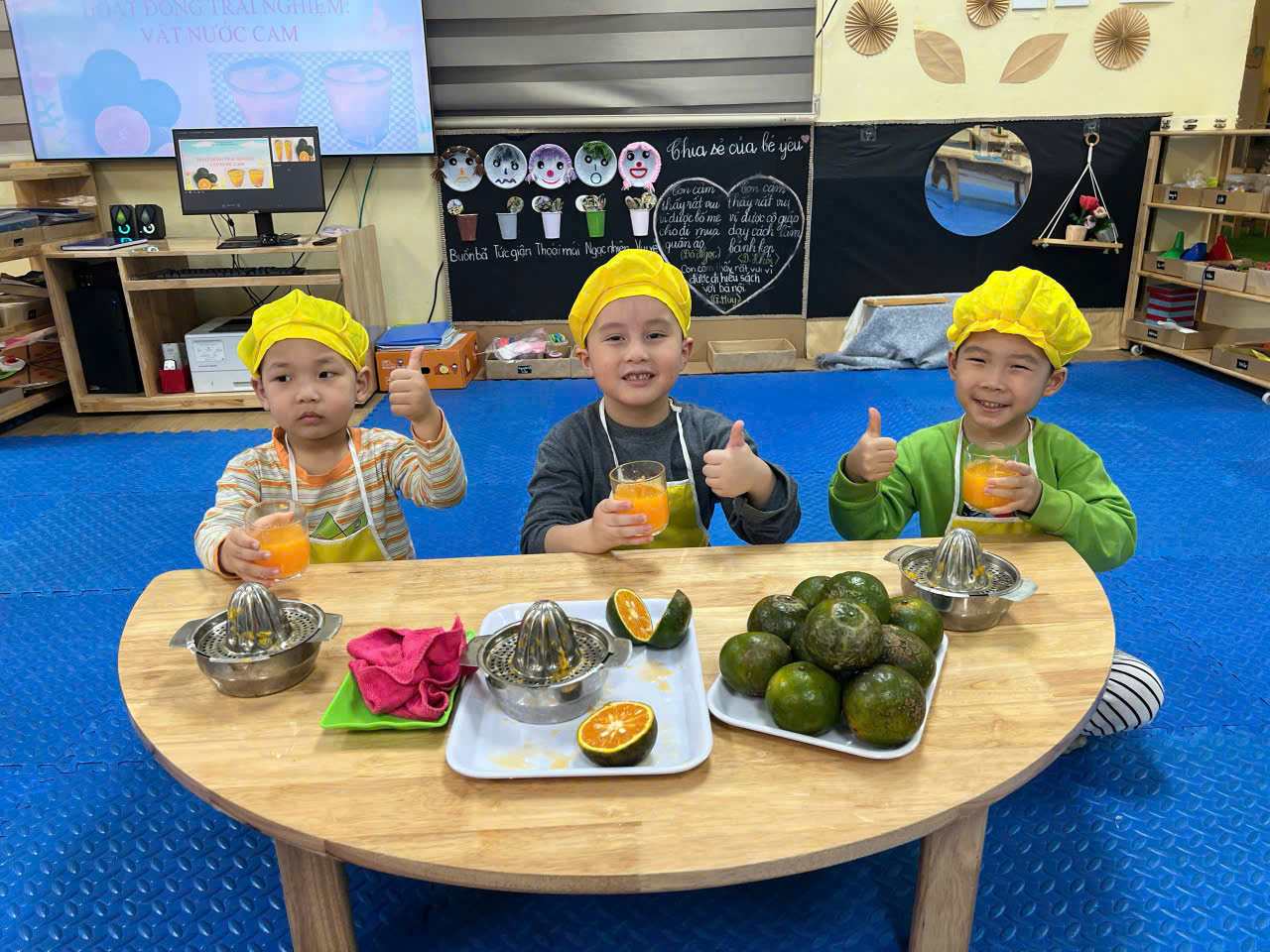 C:\Users\THANH GIONG\Desktop\Ảnh hoạt động B3\pha nước cam 6.jpg